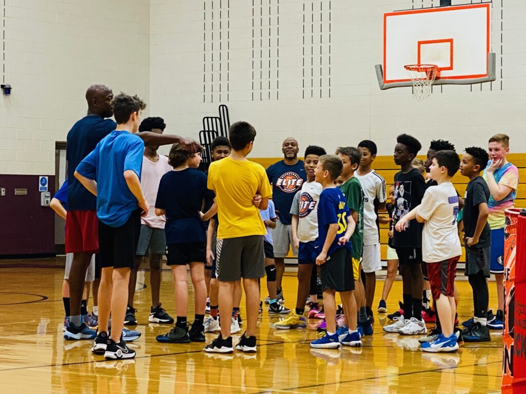 Elite Hoopers huddle after every workout
